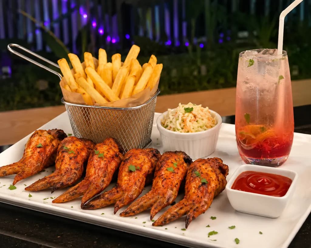 Kathir Signature Dish with Crisp Fries, Dips and Artisanal Beverages